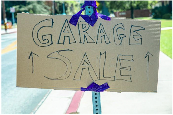 garage sale sign on pole